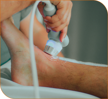 doctor providing shockwave therapy services